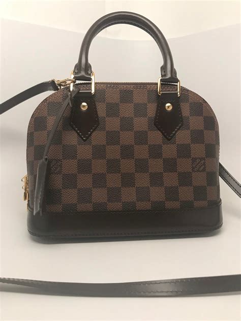 louis vuitton alma bb damier ebene fake|damier ebene canvas louis vuitton.